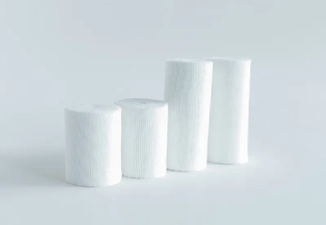 Scegliere il rotolo di garza destro: cotone vs. Materiali sintetici